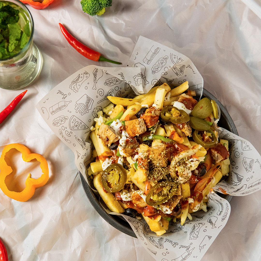 Mouthwatering French Fries Loaded with Crispy Chicken & Fresh Vegetables